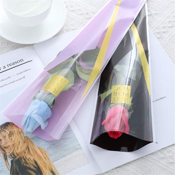 50pcs/lot wrapping plastic single rose flower packaging bag party decorations rose boxes cases for flowers just for you
50pcs/lot wrapping plastic single rose flower packaging bag party decorations rose boxes cases for flowers just for you