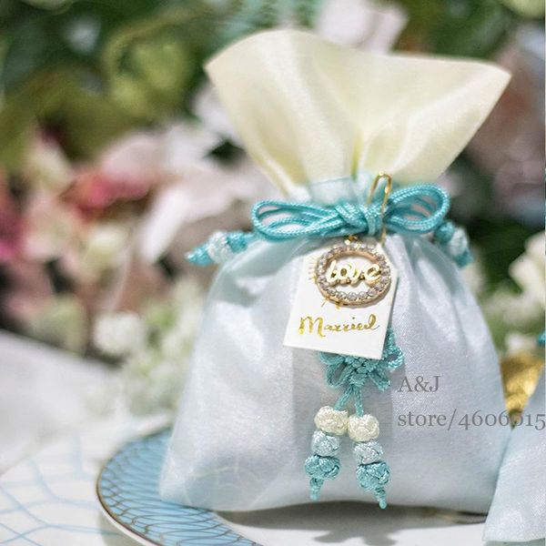 50pcs lot unique love pandent party favors container baby shower candy bags wedding return gifts chocolate bag for guests
50pcs lot unique love pandent party favors container baby shower candy bags wedding return gifts chocolate bag for guests