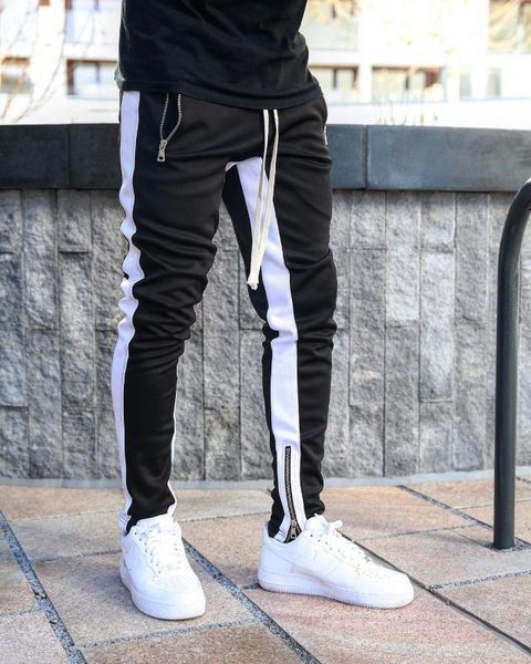 new jogger sports casual pantalones men' pants gym fitness sports foot zipper jogging casual pants men size m-2xl1, Black 
new jogger sports casual pantalones men' pants gym fitness sports foot zipper jogging casual pants men size m-2xl1, Black