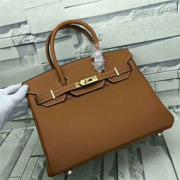 the selling fashion new brand leather clutch bag 30cm large joker business classic ladies bag with ribbon leisure luxury boston bag
the selling fashion new brand leather clutch bag 30cm large joker business classic ladies bag with ribbon leisure luxury boston bag