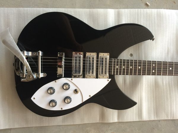 semi hollow black rick electric guitar fingerboard rosewood ,tremolo bridge 3 pickups
semi hollow black rick electric guitar fingerboard rosewood ,tremolo bridge 3 pickups