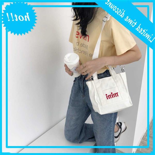c35 ins super fire small cloth simple mini square korean version girl's one shoulder handbag student's inclined span bag 
c35 ins super fire small cloth simple mini square korean version girl's one shoulder handbag student's inclined span bag