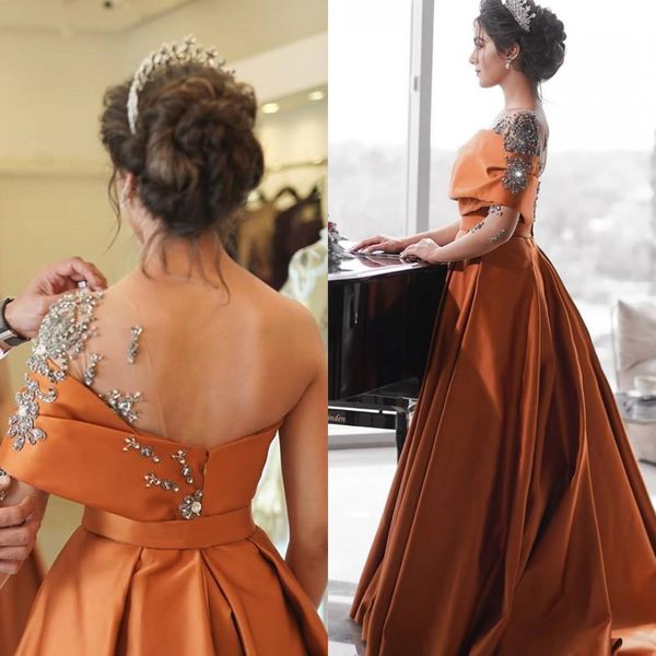 new one shoulder long sleeve evening dresses with rhinestone ruched satin a line bride party formal prom dresses vestidos de novia l133, Black;red
new one shoulder long sleeve evening dresses with rhinestone ruched satin a line bride party formal prom dresses vestidos de novia l133, Black;red