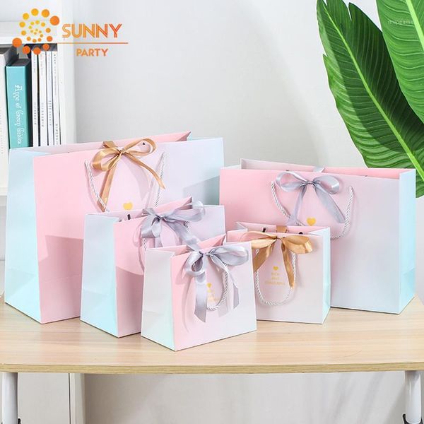 gift wrap pink gradient paper package bags ribbon bow-knot blessing clothing store tote bag birthday souvenir packaging supplies1
gift wrap pink gradient paper package bags ribbon bow-knot blessing clothing store tote bag birthday souvenir packaging supplies1