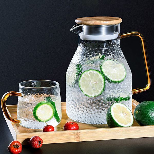 transparent jug cold tea pot glass stainless steel flow lid water carafe with handle heat-proof teapot set q1218
transparent jug cold tea pot glass stainless steel flow lid water carafe with handle heat-proof teapot set q1218