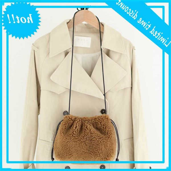 korean version lamb hair with bucket foreign girl cute shoulder versatile fashion plush messenger bag
korean version lamb hair with bucket foreign girl cute shoulder versatile fashion plush messenger bag