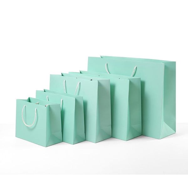 gift wrap 10pcs/lot blue kraft paper bags with handles shopping package year diy wedding birthday party present
gift wrap 10pcs/lot blue kraft paper bags with handles shopping package year diy wedding birthday party present