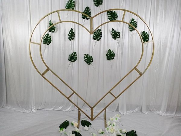party decoration iron heart-shaped shelf birthday cake stand arch outdoor lawn background wedding props
party decoration iron heart-shaped shelf birthday cake stand arch outdoor lawn background wedding props