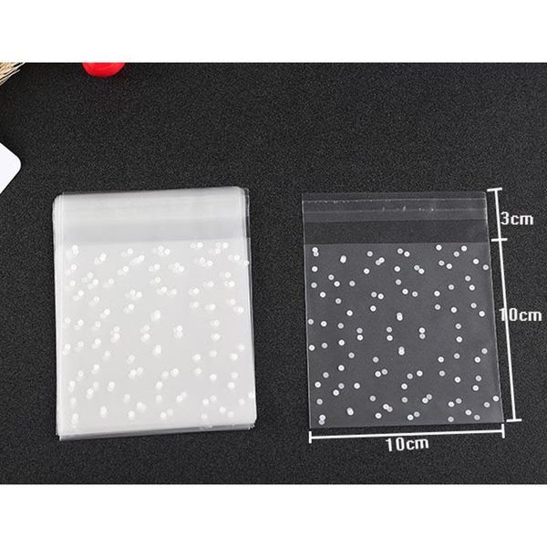 50pcs lot white dots transparent opp self adhesive bags gift packaging bags plastic jewelry candy cookies packing bags wmtjcj bdesybag
50pcs lot white dots transparent opp self adhesive bags gift packaging bags plastic jewelry candy cookies packing bags wmtjcj bdesybag