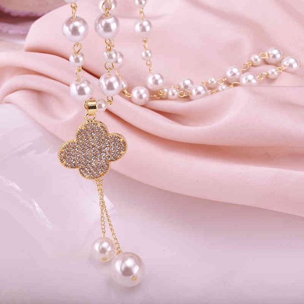 long imitation pearl necklace women's new lucky grass tassel crystal full diamond pendant chain autumn winter sweater, Silver
long imitation pearl necklace women's new lucky grass tassel crystal full diamond pendant chain autumn winter sweater, Silver