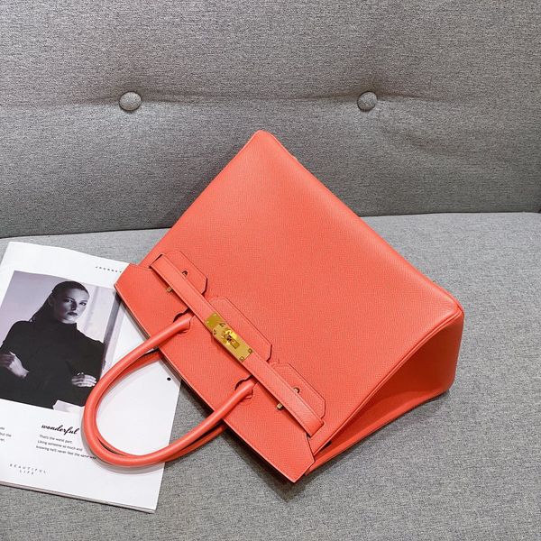 by order wholesale half handmade quality epsom leather design purse25cm wax line stitching gold and silver hardware message me for discount
by order wholesale half handmade quality epsom leather design purse25cm wax line stitching gold and silver hardware message me for discount