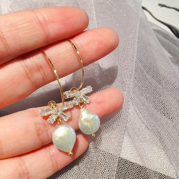 high-end large bowknot dangle earrings gold color cubic zircon baroque style freshwater pearl earrings for women, Silver
high-end large bowknot dangle earrings gold color cubic zircon baroque style freshwater pearl earrings for women, Silver