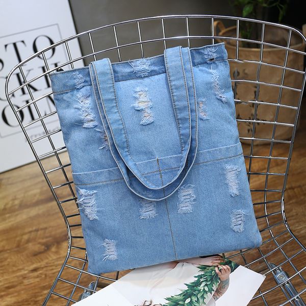 student schoolbag canvas lady shoulder bag large capacity pure color womens washed denim hole duffel bag
student schoolbag canvas lady shoulder bag large capacity pure color womens washed denim hole duffel bag