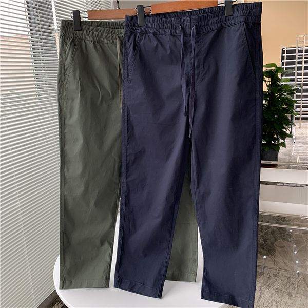 men's summer commuter business casual pants with elastic waist and wind drawstring in fitting room
men's summer commuter business casual pants with elastic waist and wind drawstring in fitting room