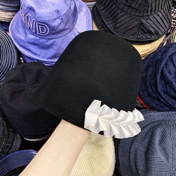 and designer's personalized autumn winter wool pure color bucket hat with white fungus edge decoration, Blue;gray
and designer's personalized autumn winter wool pure color bucket hat with white fungus edge decoration, Blue;gray