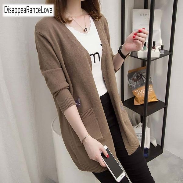 casual long knitted cardigan autumn korean elegant women loose solid color pocket outwear sweater jacket cape cartoon y200910, White;black
casual long knitted cardigan autumn korean elegant women loose solid color pocket outwear sweater jacket cape cartoon y200910, White;black