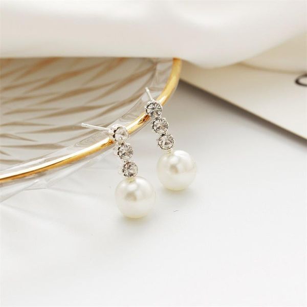 fashion inlay three rhinestones big pearl stud earrings korean exquisite earrings women party accessories, Golden;silver
fashion inlay three rhinestones big pearl stud earrings korean exquisite earrings women party accessories, Golden;silver