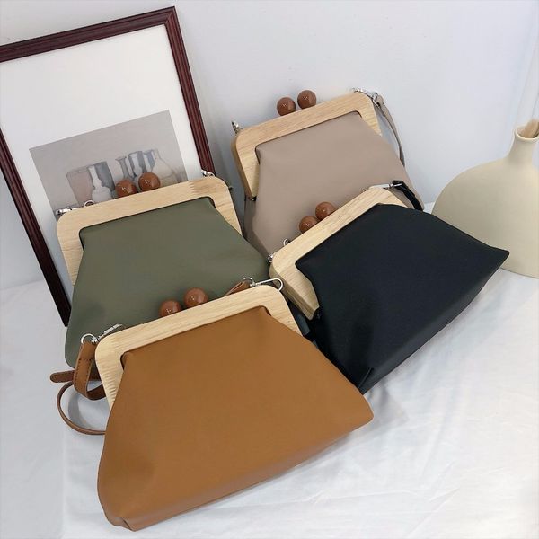 vintage wooden clip women shoulder bags luxury pu leather crossbody bag designer lady messenger bag clutch purse bolso femenino c1016
vintage wooden clip women shoulder bags luxury pu leather crossbody bag designer lady messenger bag clutch purse bolso femenino c1016