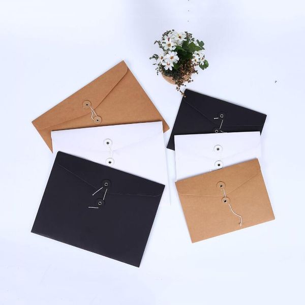 brown kraft paper a5/a4 document holder file storage bag pocket envelope with storage string lock office supply pouch 
brown kraft paper a5/a4 document holder file storage bag pocket envelope with storage string lock office supply pouch