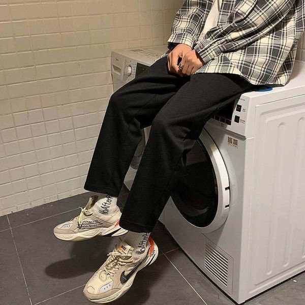 2021 fashion men casual straight loose pants solid color male trousers black gray joggers sweatpants1 
2021 fashion men casual straight loose pants solid color male trousers black gray joggers sweatpants1