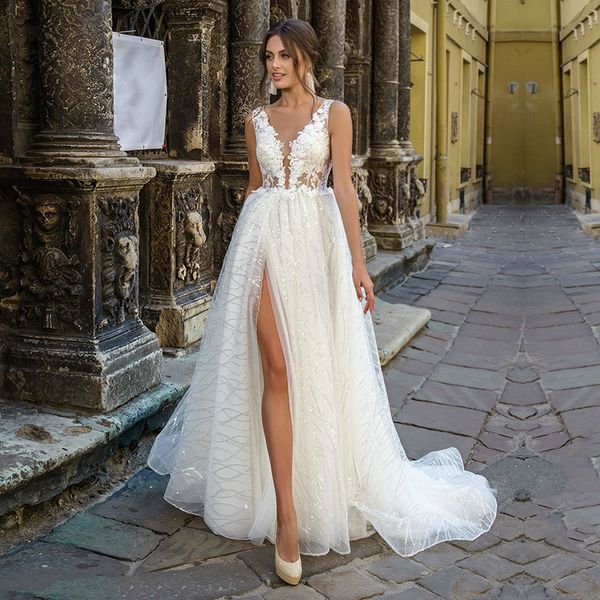boho wedding dress v-neck appliques shiny wedding gown a-line high side split white bridal dress robe mariage femme
boho wedding dress v-neck appliques shiny wedding gown a-line high side split white bridal dress robe mariage femme