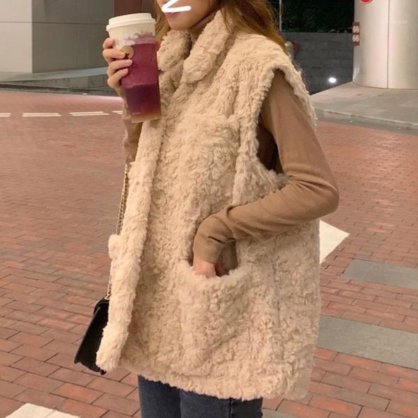 autumn and winter 2020 new korean version retro vest jacket 100 warm temperament loose plush jacket female1, Black;white
autumn and winter 2020 new korean version retro vest jacket 100 warm temperament loose plush jacket female1, Black;white