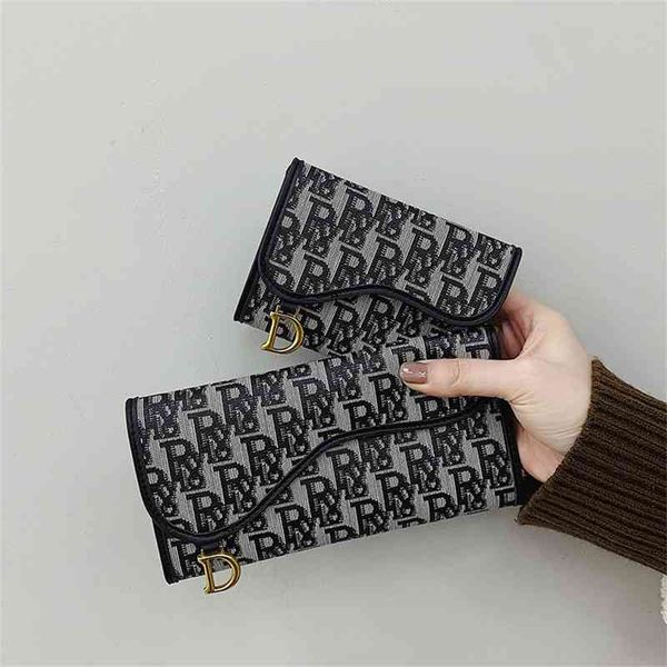 small wallet women's short ultra thin folding small change clip retro multi card long hand bag 60% off wholesale sales, Red;black
small wallet women's short ultra thin folding small change clip retro multi card long hand bag 60% off wholesale sales, Red;black