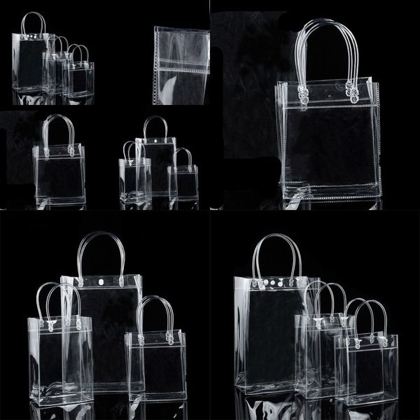pvc plastic gift bags with handles plastic wine packaging bags clear handbag party favors bag fashion bags with button 92 g2
pvc plastic gift bags with handles plastic wine packaging bags clear handbag party favors bag fashion bags with button 92 g2