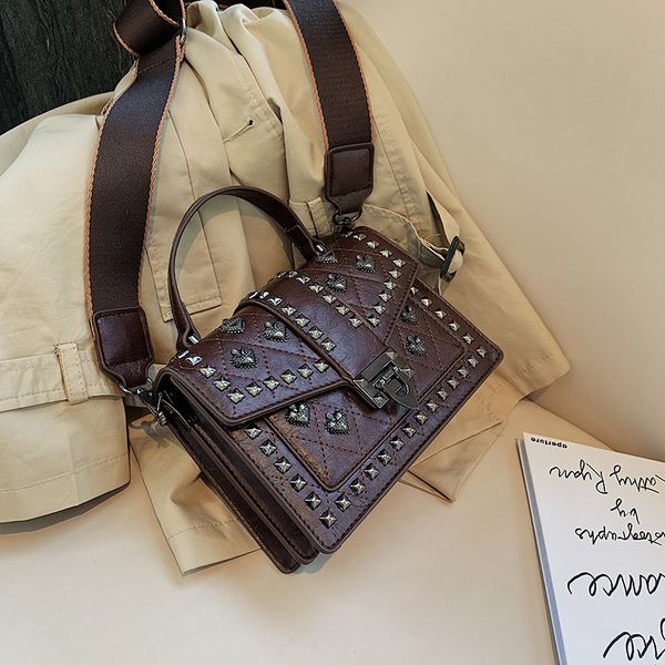 rivet handbag for women female quality pu leather shoulder bag classical rivets design messenger bag women flap
rivet handbag for women female quality pu leather shoulder bag classical rivets design messenger bag women flap