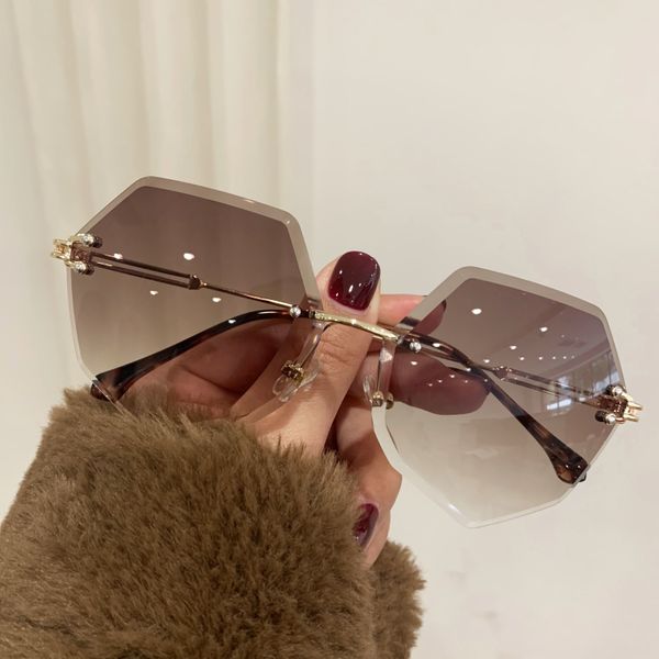 trimmed tan frameless sunglasses, female round face, square polygon, personalized style, high grade sunglasses, White;black
trimmed tan frameless sunglasses, female round face, square polygon, personalized style, high grade sunglasses, White;black