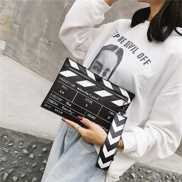 new street style hip hop 3d director board style messenger bag women's clutch shoulder bags large capacity bag female
new street style hip hop 3d director board style messenger bag women's clutch shoulder bags large capacity bag female