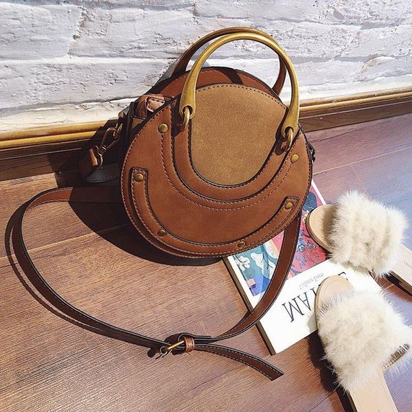 new women's handbag women's bag european and american fashion retro rivet single shoulder messenger bag small round
new women's handbag women's bag european and american fashion retro rivet single shoulder messenger bag small round