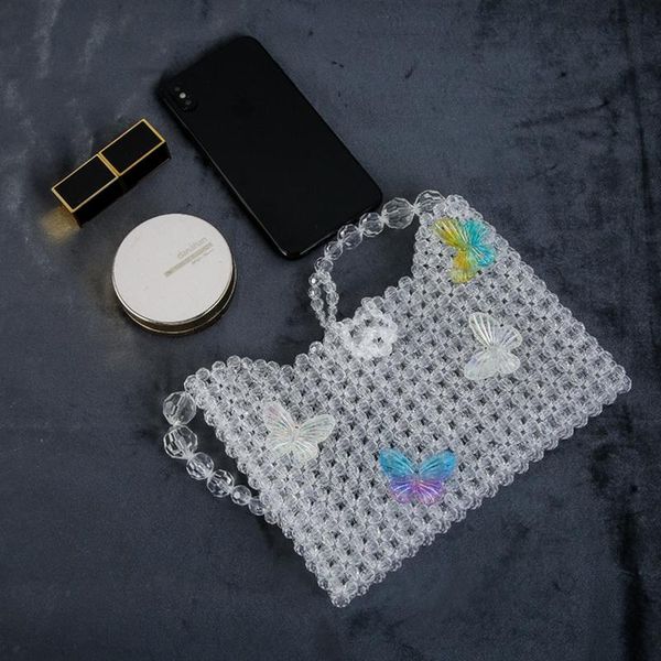 portable pearl hollow hand-woven handbag small transparent crystal messenger bag butterfly bead armpit bags travel vacation
portable pearl hollow hand-woven handbag small transparent crystal messenger bag butterfly bead armpit bags travel vacation
