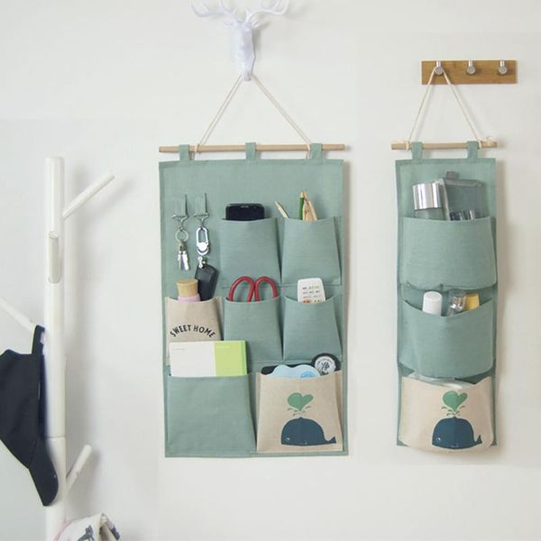 cotton and linen hanging seven pocket storage bag cotton linen wardrobe wall pouch toys for bedroom kitchen bathroom 
cotton and linen hanging seven pocket storage bag cotton linen wardrobe wall pouch toys for bedroom kitchen bathroom