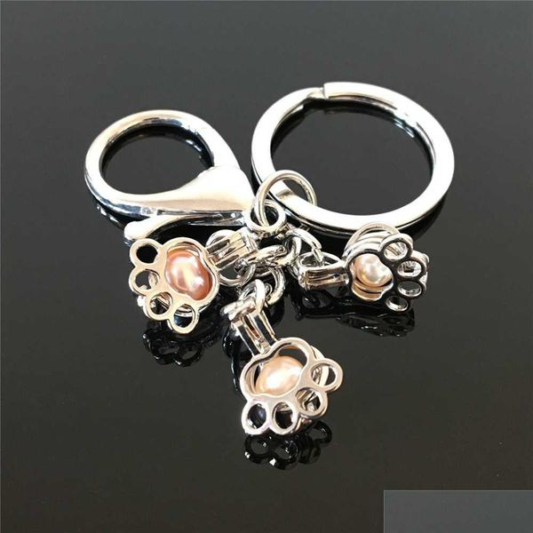 euro-american popular paw print pearl cage key ring can open hollow pearl noctilucent pearl volcanic stone pendant key ring bkdqa, Silver
euro-american popular paw print pearl cage key ring can open hollow pearl noctilucent pearl volcanic stone pendant key ring bkdqa, Silver