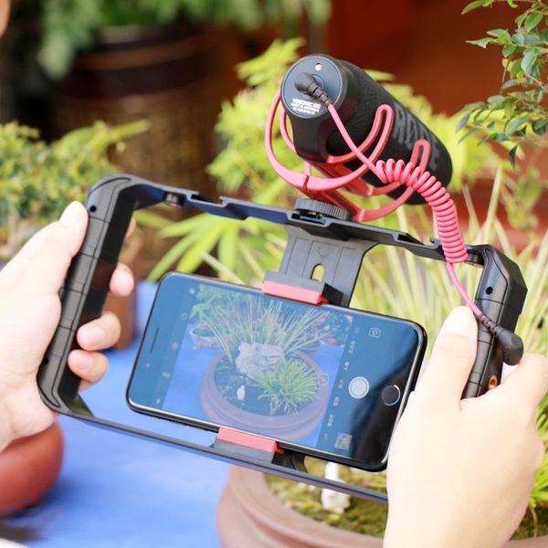 universal u rig pro smartphone video rig holder phone video camera cage stabilizer grip tripod holder for andriod 1pc
universal u rig pro smartphone video rig holder phone video camera cage stabilizer grip tripod holder for andriod 1pc