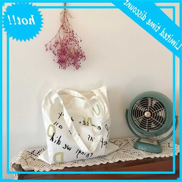 e91 ins hanfeng handwritten letter printed gold shoulder small fresh canvas shopping bag girls' school
e91 ins hanfeng handwritten letter printed gold shoulder small fresh canvas shopping bag girls' school