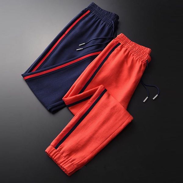 running pants spring and autumn soft texture blended fabric side webbing trimming feet slim sports casual men, Black;blue
running pants spring and autumn soft texture blended fabric side webbing trimming feet slim sports casual men, Black;blue