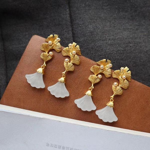 natural hetian white jade geometric triangle earrings chinese style retro unique ancient gold craft charm women's silver jewelry
natural hetian white jade geometric triangle earrings chinese style retro unique ancient gold craft charm women's silver jewelry
