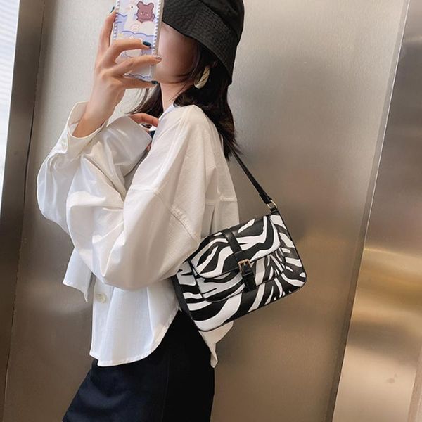 zebra pattern pu кожаная сумка для женщин мода дизайнерские плечевые сумки женские стремянки имеют ручную сумку
zebra pattern pu кожаная сумка для женщин мода дизайнерские плечевые сумки женские стремянки имеют ручную сумку