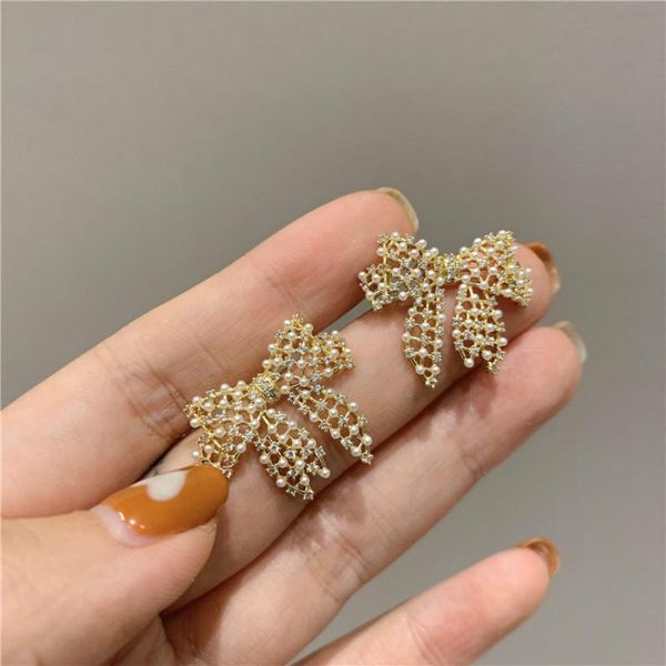 stud 2021 korea fund bowknot tassel hollow-out pearl earring temperament is melting simple female jewelry, Golden;silver
stud 2021 korea fund bowknot tassel hollow-out pearl earring temperament is melting simple female jewelry, Golden;silver