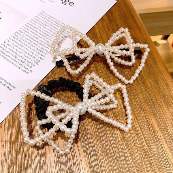 hair accessories korean temperament simple multi-layer imitation pearl big bow rubber band hairpins fashion sweet girl women's
hair accessories korean temperament simple multi-layer imitation pearl big bow rubber band hairpins fashion sweet girl women's