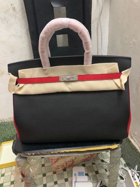 by order only half handmadequality 40cm wotnes togo leather design purse wax stitching gold and silver hardware contact for details
by order only half handmadequality 40cm wotnes togo leather design purse wax stitching gold and silver hardware contact for details