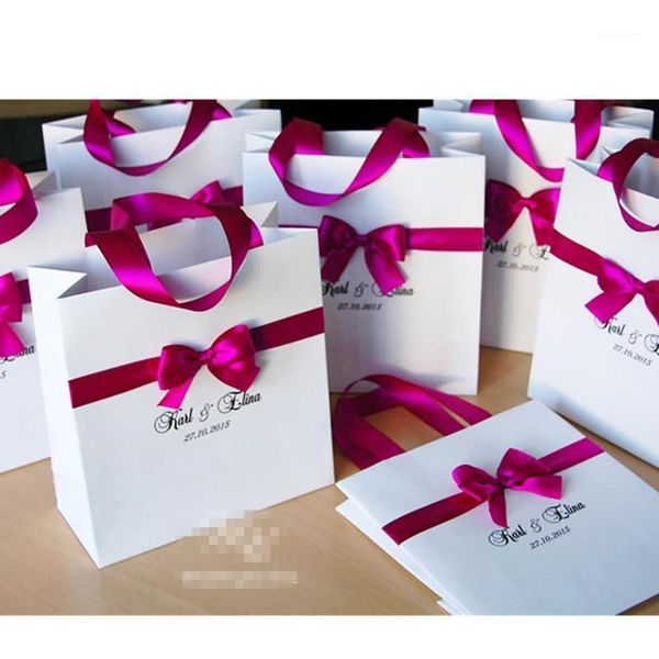 personalized wedding welcome bags with satin ribbon, bow and names white and fucshia elegant custom weddings paper bags1
personalized wedding welcome bags with satin ribbon, bow and names white and fucshia elegant custom weddings paper bags1
