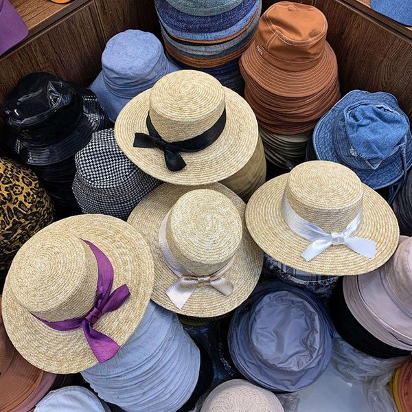 eaves flat wide summer vacation beach straw weaving vertical feeling yingdong bow hat, Blue;gray
eaves flat wide summer vacation beach straw weaving vertical feeling yingdong bow hat, Blue;gray