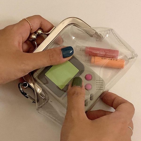 new ins simple small storage bag lipstick coin card clear transparent pvc coin purse, Red;black
new ins simple small storage bag lipstick coin card clear transparent pvc coin purse, Red;black