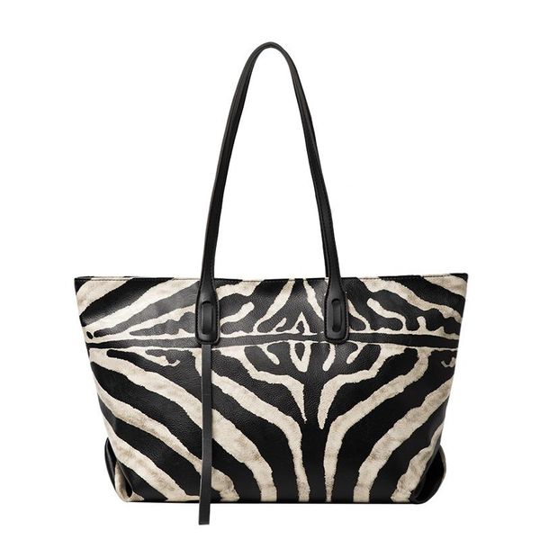pu zebra pattern bag women's 2020 new tote bag college student class shoulder large capacity
pu zebra pattern bag women's 2020 new tote bag college student class shoulder large capacity