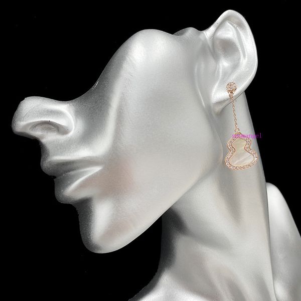 merry christmas to yougourd earrings white shellfish 925 silver needle rose gold gourd earrings female long tide
merry christmas to yougourd earrings white shellfish 925 silver needle rose gold gourd earrings female long tide