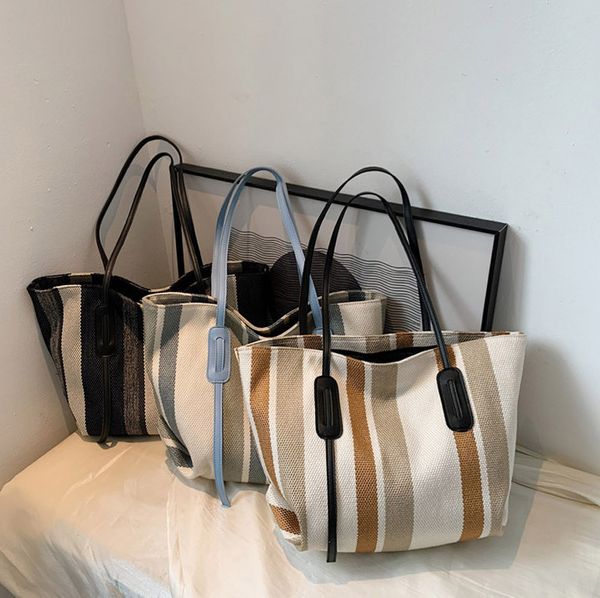 dhl50pcs stuff sacks women canvas large capactiy vertical striped cross hasp totes mix color
dhl50pcs stuff sacks women canvas large capactiy vertical striped cross hasp totes mix color