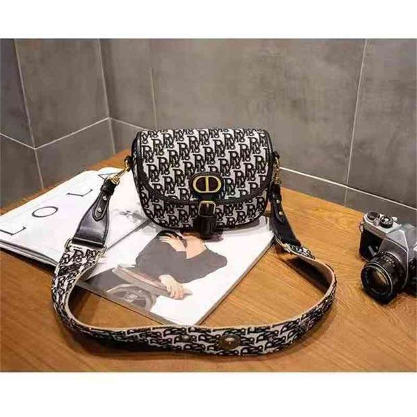 2022 factory wholesale embroidered canvas trend women's slung ins fashion single shoulder mini bag
2022 factory wholesale embroidered canvas trend women's slung ins fashion single shoulder mini bag